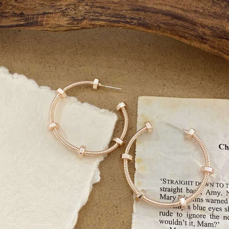 Geometric Hollow Metal Hoop Earrings in Silver