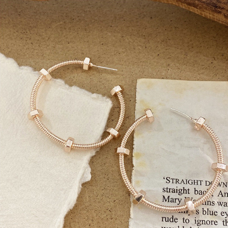 Geometric Hollow Metal Hoop Earrings in Silver