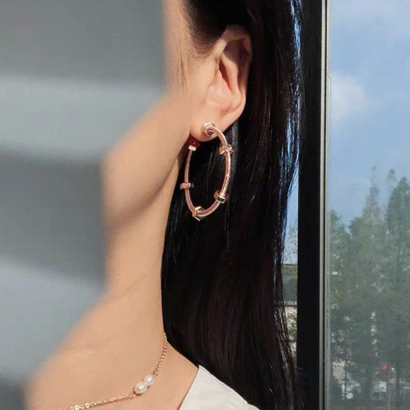 Geometric Hollow Metal Hoop Earrings in Silver